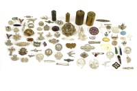 Lot 62 - A collection of brooches and a patent wax vesta