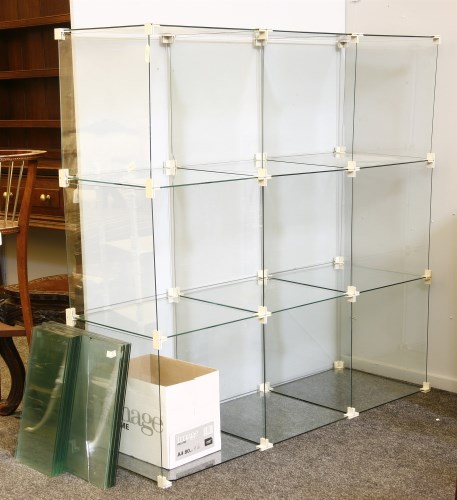 Lot 499 - A 1970s Raum Technik System sectional glass display cabinet
