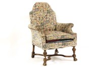 Lot 498 - A Carolean design oak armchair