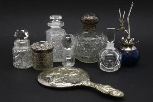 Lot 99 - A silver topped cut glass scent bottle