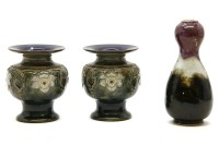 Lot 180 - A pair of Doulton Art Nouveau inspired vases