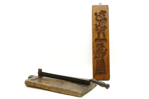 Lot 267 - A hand carved wooden double sided biscuit mould in the form of a Punch and Judy