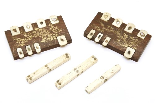 Lot 89 - A late 19th century Japanese ivory and hardwood counters