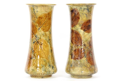 Lot 194 - A pair of Doulton leaf moulded vases