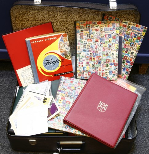 Lot 112 - A large suitcase with a large quantity of stamps