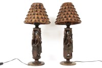 Lot 256 - A pair of African 'Tree of Knowledge' table lamps