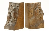 Lot 174 - A pair of carved wooden bookends