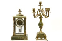 Lot 303 - A late 19th century French four glass mantel clock with onyx base and mercury pendulum