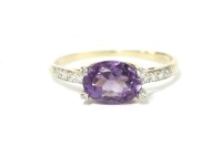 Lot 37 - A 9ct gold single stone oval cut amethyst and diamond ring
