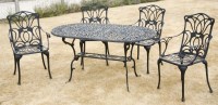 Lot 553 - Cast garden table