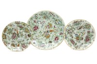 Lot 277 - Three Chinese famille rose plates