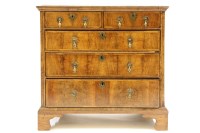 Lot 487 - A Queen Anne walnut and oak chest