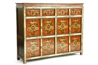 Lot 523 - A large painted Tibetan panelled cupboard