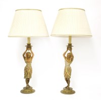 Lot 518 - A pair of cast metal table lamps