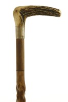 Lot 242 - An oak 'barley corn' carved walking stick