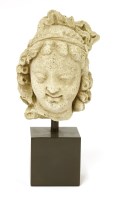 Lot 286 - A stucco head of a crowned bodhisattva