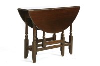 Lot 558A - An 18th century mahogany gate leg table