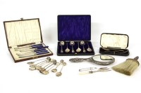 Lot 99 - An unusual set of fine silver coffee spoons