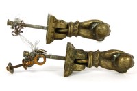 Lot 349 - A pair of brass 'hand of Fatima' door knockers