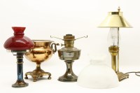 Lot 295 - A group of four 19th century and later oil lamps