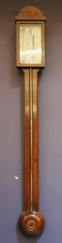 Lot 394 - A mahogany stick barometer