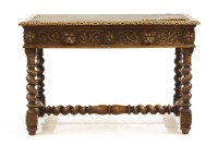 Lot 531 - A Victorian carved oak writing table