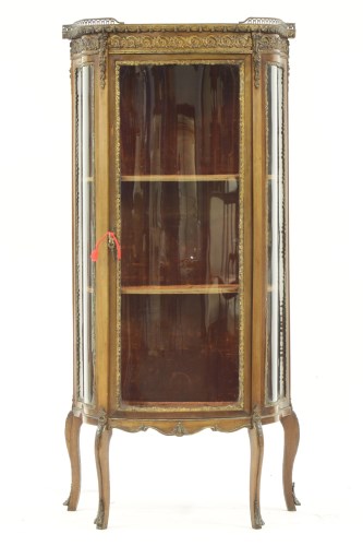 Lot 586 - A marble top mahogany display cabinet