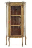 Lot 586 - A marble top mahogany display cabinet
