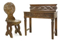 Lot 611 - A Jacobean style oak side table and a hall chair