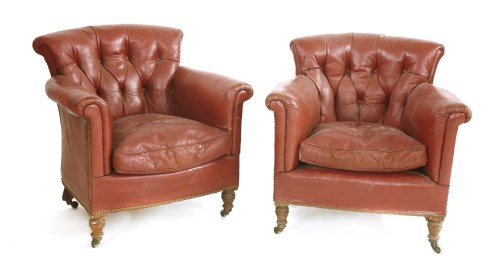 Lot 609 - A pair of Victorian crimson leather armchairs