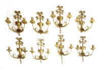 Lot 614 - A set of eight George III-style twin-branch wall lights