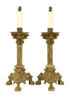 Lot 617 - A pair of cast table lamps