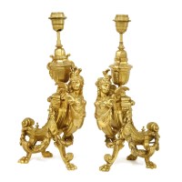 Lot 620 - A pair of gilt table lamps