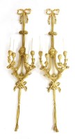 Lot 621 - A pair of gilt bronze four-branch wall lights