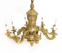 Lot 626 - A giltwood eight-branch chandelier