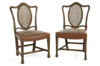 Lot 523 - A pair of mahogany and cane hall chairs (2)