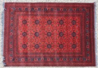 Lot 672 - A Persian red ground carpet