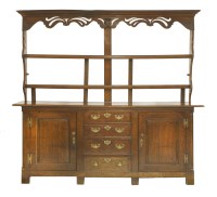 Lot 471 - A George III oak dresser