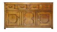 Lot 472 - A George III oak dresser