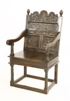 Lot 473 - An oak wainscot chair