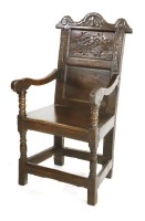 Lot 474 - An oak wainscot chair