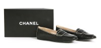 Lot 1391 - A pair of vintage Chanel black leather loafers
