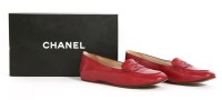 Lot 1392 - A pair of vintage Chanel red loafers