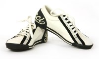 Lot 1398 - A pair of ladies' Gucci white leather bowling shoes