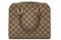 Lot 1215 - A Louis Vuitton Damier brown leather handbag