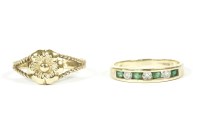 Lot 20 - A 9ct gold diamond and emerald half eternity ring