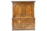 Lot 509 - A George III oak cupboard