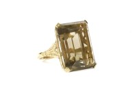 Lot 7 - A gold single stone emerald cut smokey quartz ring