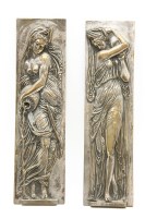 Lot 181 - A pair of silvered cast plaques