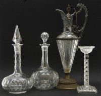 Lot 232 - A cut glass and pewter mounted claret jug